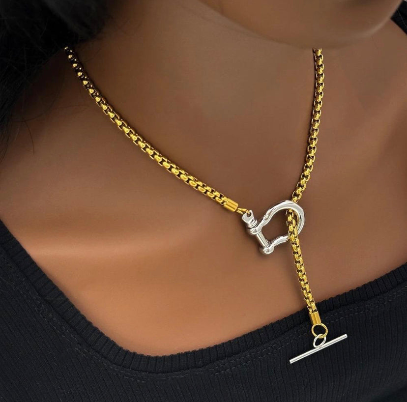 Horseshoe necklace and cross choker