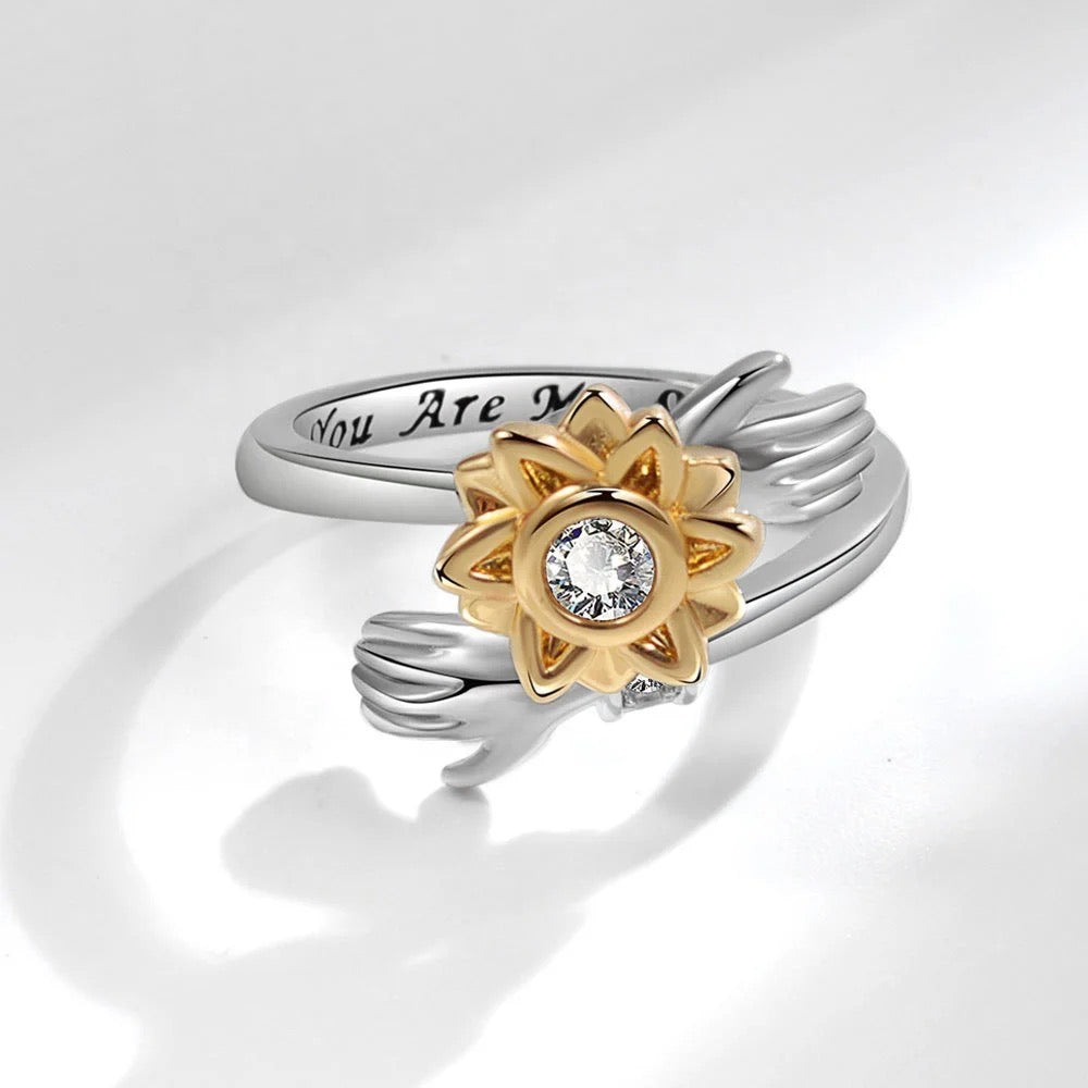 Anillo exclusivo de abrazo de girasol