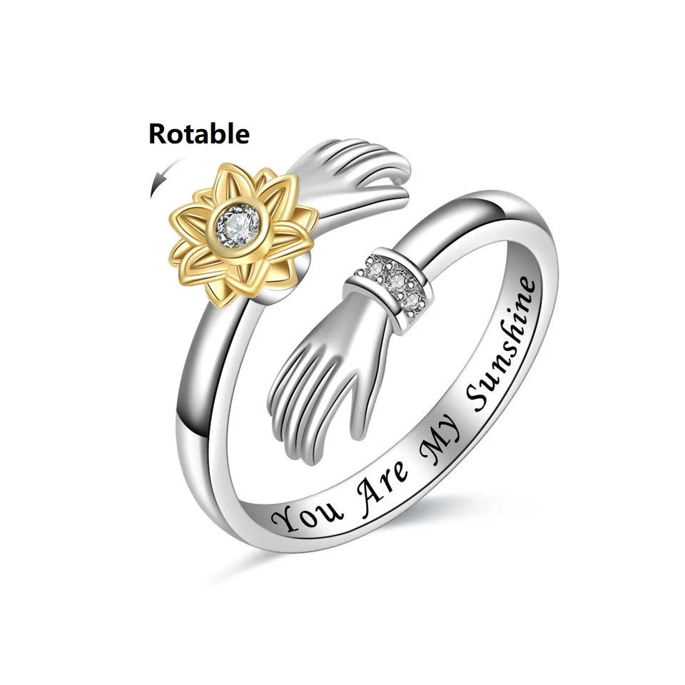 Anillo exclusivo de abrazo de girasol